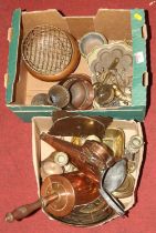 Two boxes of mixed metalware to include a Victorian brass chamberstick, brass desk calendar, inkwell