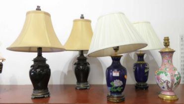 A pair of Chinese cloisonne enamel table lamps and shades of baluster shape, each mounted to a