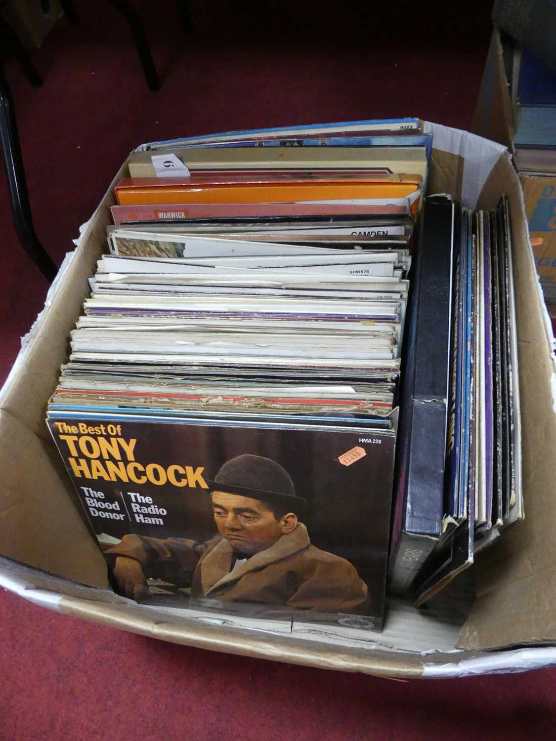 A collection of vintage LPs to include Tony Hancock, Ray Martin, and Glenn Miller