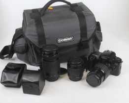 A Canon EOS 1000F 35mm SLR camera with bag and accessories Camera does not seem to be working