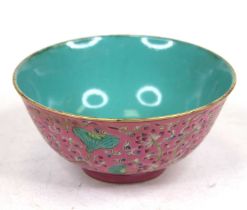 A Chinese porcelain bowl, enamel decorated with flowers, dia. 16.5cm
