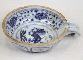 A Chinese blue and white porcelain dish, decorated with a qilin and having a spout, w.18cm