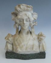 An Italian Art Nouveau carved alabaster bust modelled as a head and shoulders portrait of young