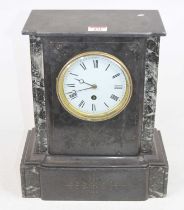 A Victorian black slate mantel clock, the enamel dial showing Roman numerals, h.32cm