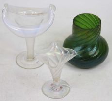 A Loetz style green iridescent glass vase, h.11cm; together with two further iridescent glass