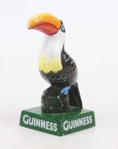 A cast iron Guinness toucan, h.15cm