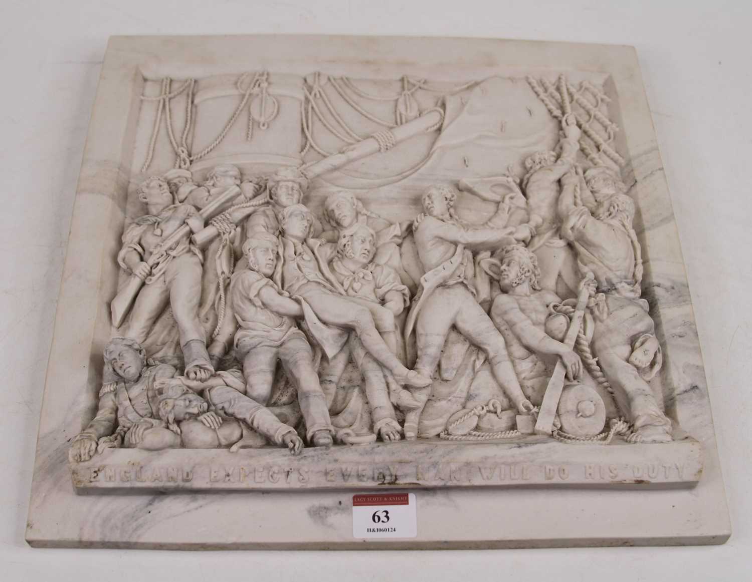 A simulated marble plaque to commemorate the Battle of Trafalgar, moulded in high relief with a