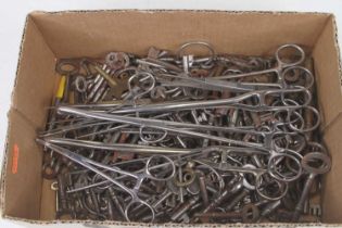 A box of assorted Georgian and later furniture keys; a small number of door keys; veterinary tools