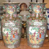 A pair of 20th century Chinese Canton style floor vases, each enamel decorated with figures, h.