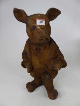 A cast iron garden figure of a standing novelty pig, 43cm