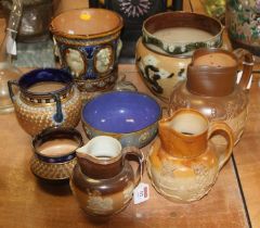 A collection of Doulton stoneware, to include Harvest pattern jugs (8)