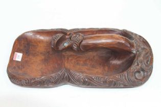 A Maori carved wood and mother of pearl inlaid canoe bailer, signed Tutu Honotapu verso, 42 x 23cm