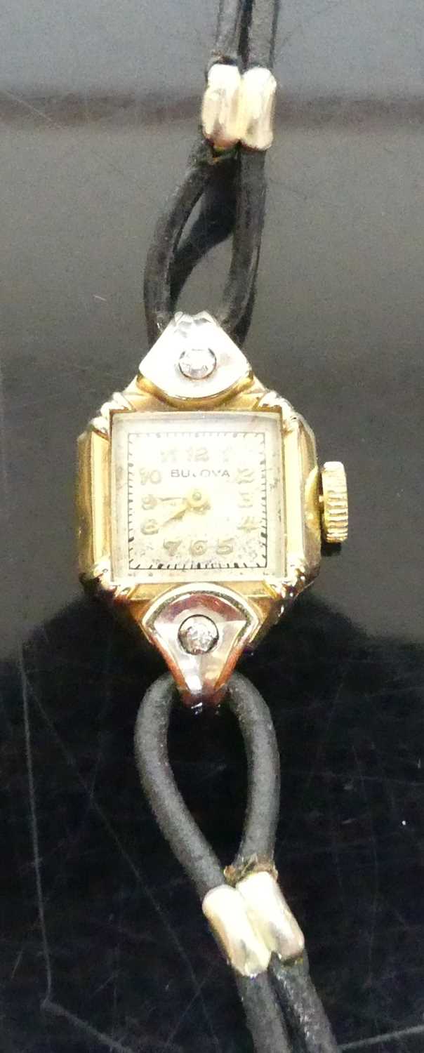 A lady's Bulova 14ct gold cased dress watch, the lugs each set with a small round cut diamond, the - Image 4 of 5