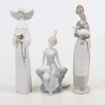 Two Lladro porcelain figures of young ladies, the largest h.27cm; together with another porcelain