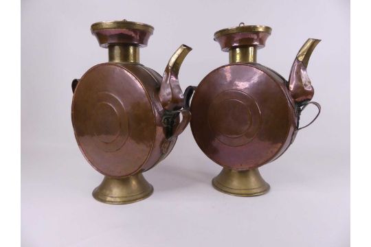 A pair of Eastern copper drum-shaped canisters, each having a hinged circular lid and hexagonal - Image 2 of 2