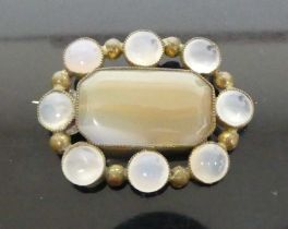 A pinchbeck chalcedony oval panelled brooch, 11.8g, 50x35mm