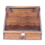 A late Victorian oak and stained pine stationery box, width 39cm, together with an Indian carved