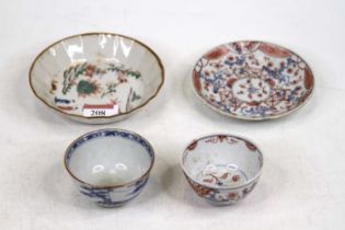 A Chinese blue and white porcelain tea bowl, dia.7cm; together with another tea bowl with saucer (