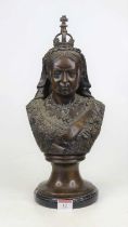 A bronzed metal head & shoulders bust of Queen Victoria, mounted to a polished black hardstone