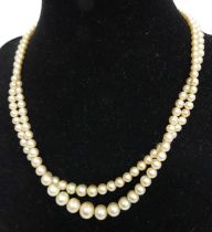 A Ciro cultured pearl graduated double string choker, with 9ct gold clasp, 36cm, in probably