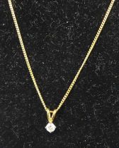 An 18ct gold and diamond pendant, the four claw set brilliant weighing approx 0.17ct on 18ct gold