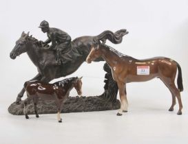 A Beswick model of a horse, chestnut gloss, height 20cm, together with another smaller (a/f), and