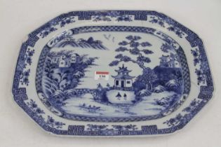 An 18th century Chinese blue and white porcelain meat dish, decorated with pagodas within a