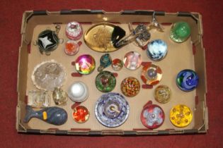 A collection of studio glass paperweights to include examples by Caithness