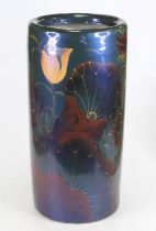 A blue glazed pottery stick stand, of cylindrical shape, hand painted with birds and flowers, h.