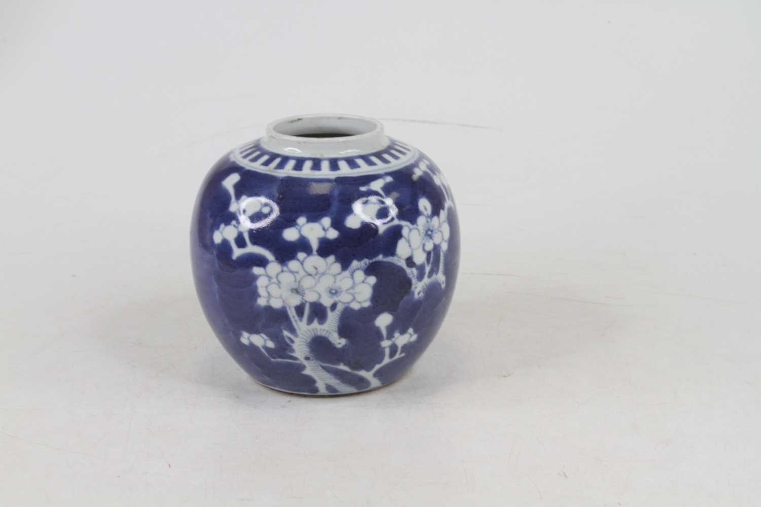 A Chinese blue and white porcelain ginger jar in the prunus pattern (lacking lid), h.12cm - Image 3 of 3
