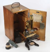 An early 20th century Ernst Leitz Vetzlar No. 198758 monocular microscope, together with various