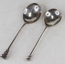 An antique silver seal topped spoon together with one other similar example, gross weight 3.1oz (