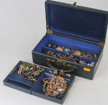 A jewellery box and contents of assorted costume to include paste set rings, beaded necklaces,