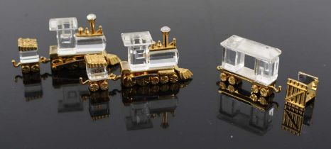 A collection of Swarovski crystal Memories, being three locos and tenders (one a/f), in box