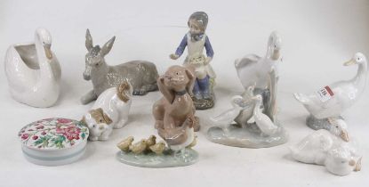 A collection of ten Nao porcelain figures, the largest h.14cm; together with a Limoges porcelain