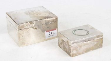 A George VI silver clad table cigarette box of rectangular shape, having a cedar lined interior,