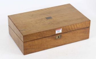 A Victorian walnut writing slope, the hinged lid inset with a brass plaque engraved F.A.T.,