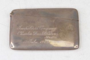 A silver calling card case having engraved presentation inscription London 1904, 2.6oz, 10cm