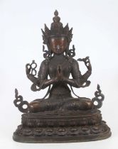 A bronzed metal figure of Tara, shown seated, h.48cm