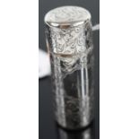 An Edwardian silver and engraved cylindrical scent bottle, with glass liner, 6.5cm