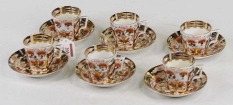 A set of 6 Derby porcelain coffee cans and saucers in the Imari palette, red mark to underside