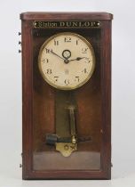 A French ATO Electrique Master clock, circa 1930, with locking pendulum and in stained beechwood