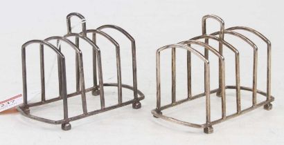 A pair of George V silver four division toast racks, 5.9oz, 11cm No real damage, just slightly