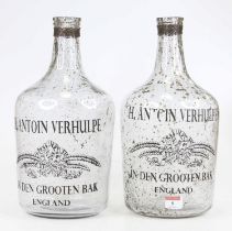 A pair of glass bottles inscribed Chantoin Verhulpen, h.36cm