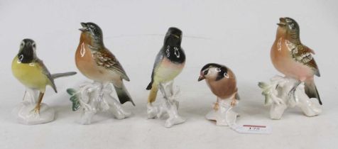 A Karl Ens porcelain figure of a wagtail, No. 7489, h.11cm; together with three other Karl Ens