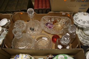 A collection of glassware to include crystal ship's decanter and paperweights