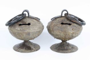 A pair of 19th century French alms? boxes, each of squat circular form with wrought iron loop