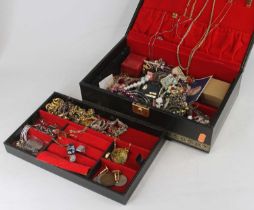 A jewellery box and contents of assorted costume to include gilt metal and beaded necklaces, paste