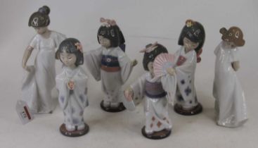 A Lladro porcelain figure of a Geisha girl, shown standing and holding two fans, h.19cm; together