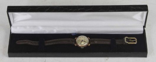 A lady's Accurist 9ct gold cased cocktail watch, having a signed circular silvered dial with